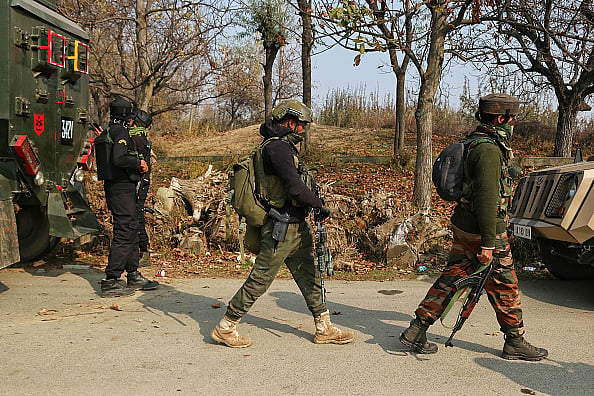 stand guard near the site in south Kashmir's Kulgam district.(Representational image) | - Getty Images